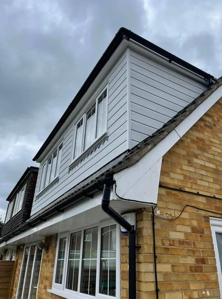 white mansard roof extention