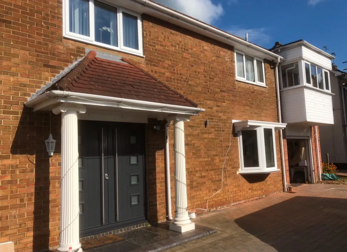 double composite door with white pillars